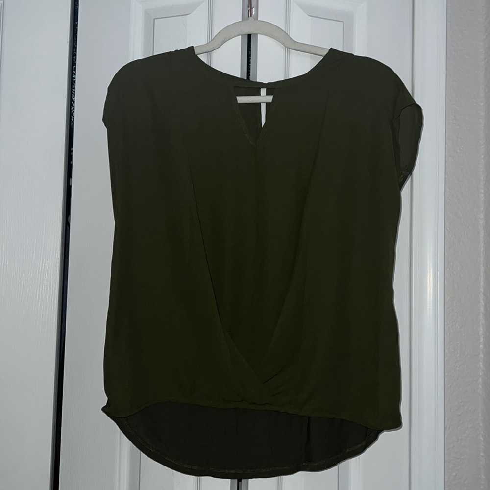 Women’s green blouse, size M. Twist detailing in front. Sheer at the shoulders